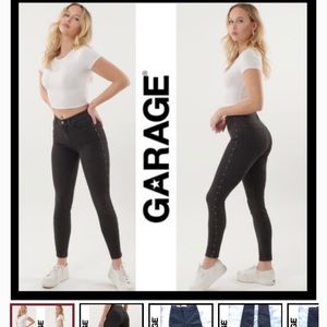 Garage high rise black studded jeans.